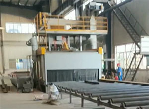 济南钢板预处理生产线安装现场，包括抛丸机、喷漆室、烘干室等